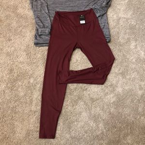 Burgundy leggings size 2 fits medium to large